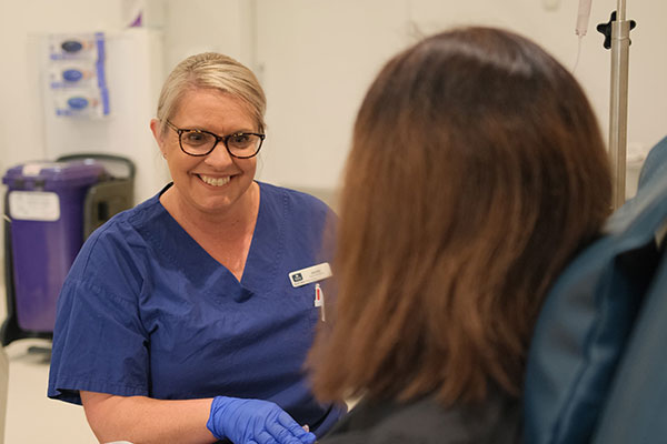 Infusion smiling nurse